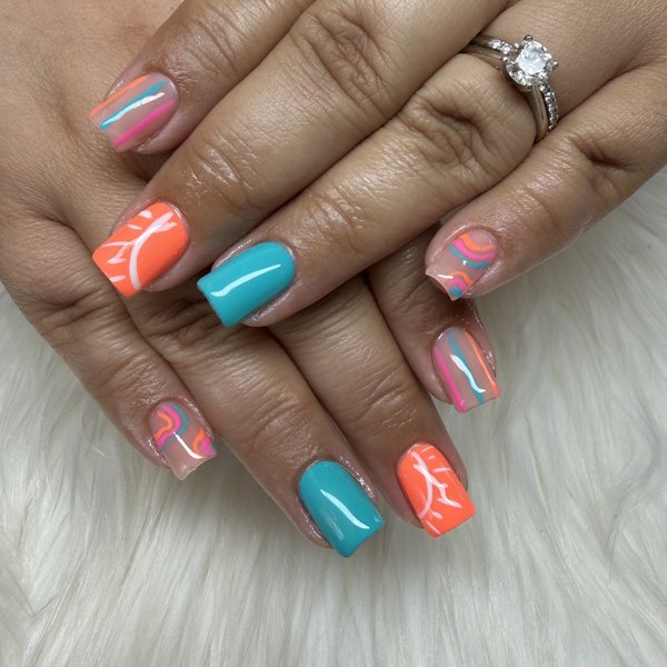 A teal, coral and pink abstract line-art BIAB set on short square nails at TLC Nails and Esthetics in Nottingham, MD