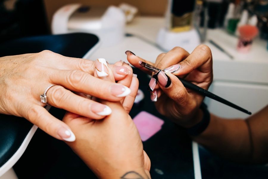 Detail work during a private nail appointment at TLC Nails and Esthetics in Nottingham, MD