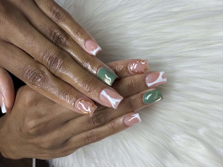 A square Gel X set with sage green shimmer accents, hand-painted white swirls, and gold-outlined tips by TLC Nails and Esthetics in Nottingham, MD