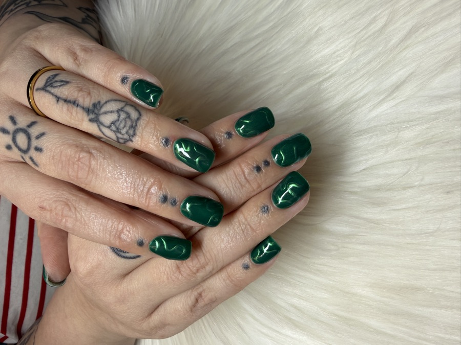 A glossy forest green Hard Gel manicure with a dense structural overlay by TLC Nails and Esthetics in Nottingham, MD